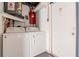 Laundry Room includes washer, dryer, storage shelf, and mechanicals at 3445 Briar Cliff Dr, Holiday, FL 34691