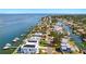 Waterfront community aerial view showcasing homes with docks and easy ocean access at 3497 Coquina Key Se Dr, St Petersburg, FL 33705