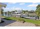 Boat dock with a yacht and smaller boat in the backyard at 3497 Coquina Key Se Dr, St Petersburg, FL 33705