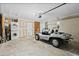 Spacious garage with washer, dryer, walls awaiting finishing, and car at 3497 Coquina Key Se Dr, St Petersburg, FL 33705