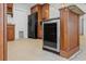 Traditional kitchen features a wine rack, granite countertops, and stainless appliances at 3497 Coquina Key Se Dr, St Petersburg, FL 33705