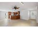 Open living space with tile floors flowing into the kitchen area at 3497 Coquina Key Se Dr, St Petersburg, FL 33705