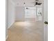 Neutral living room with tile flooring and updated ceiling fans at 3497 Coquina Key Se Dr, St Petersburg, FL 33705