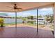 Covered patio overlooking the canal with boat dock and lift at 3497 Coquina Key Se Dr, St Petersburg, FL 33705