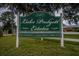 Entrance to Lake Padgett Estates, a waterfront and equestrian community, on a sunny day at 3629 Lake Breeze Dr, Land O Lakes, FL 34639