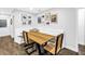 Charming dining nook with built-in bench seating and an adjacent kitchen area for easy entertaining at 3629 Lake Breeze Dr, Land O Lakes, FL 34639