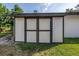 Outdoor shed offers convenient storage solutions and complements the well-maintained backyard at 3629 Lake Breeze Dr, Land O Lakes, FL 34639