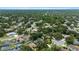 Community shot featuring mature landscaping, with easy access to local shopping and attractions at 3808 Hollow Wood Dr, Valrico, FL 33594