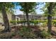 The backyard features a beautiful pool area, creating a serene and private outdoor oasis at 3808 Hollow Wood Dr, Valrico, FL 33594