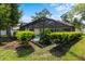A private backyard with lush greenery surrounds the sparkling pool and screened-in patio at 3808 Hollow Wood Dr, Valrico, FL 33594