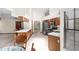 Bright kitchen boasting stainless steel appliances and ample counter space at 3808 Hollow Wood Dr, Valrico, FL 33594