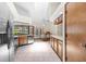 Well-lit kitchen with stainless appliances, breakfast nook, and ample cabinet space for a chef's delight at 3808 Hollow Wood Dr, Valrico, FL 33594