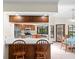 Open kitchen overlooking dining area features stainless steel appliances and wood cabinetry at 3808 Hollow Wood Dr, Valrico, FL 33594