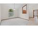Inviting living room features large windows, and a neutral carpet creating an airy and bright atmosphere at 3808 Hollow Wood Dr, Valrico, FL 33594