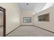 Bright and airy living room with high ceilings and neutral carpet and paint at 3808 Hollow Wood Dr, Valrico, FL 33594