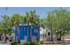 Campalong Baseball Field with a blue building and palm tree-lined entrance at 412 20Th Ave, Indian Rocks Beach, FL 33785