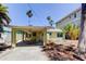 Charming home exterior featuring a carport at 412 20Th Ave, Indian Rocks Beach, FL 33785
