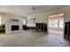 Spacious living room featuring a fireplace at 412 20Th Ave, Indian Rocks Beach, FL 33785