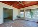Charming sunroom featuring terracotta tile flooring, a wood ceiling with fan, and ample natural light from windows at 412 20Th Ave, Indian Rocks Beach, FL 33785