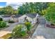 Charming one-story home with a well manicured front lawn and attached garages at 4326 Venice Dr, Land O Lakes, FL 34639