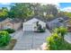 Charming single Gathering home with well maintained landscaping and attached one car garage at 4326 Venice Dr, Land O Lakes, FL 34639