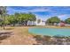 A grassy playground area with multiple swing sets and playground equipment at 4326 Venice Dr, Land O Lakes, FL 34639