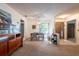 Inviting dining area featuring an elegant chandelier and seamless flow into living spaces at 4442 Summer Oak Dr, Tampa, FL 33618