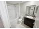The bathroom features a shower/tub combo and a granite-topped vanity at 4461 Globe Thistle Dr, Tampa, FL 33619