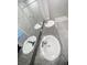 Modern bathroom with double sinks, granite countertop, and a walk-in shower, offering convenience and style at 4461 Globe Thistle Dr, Tampa, FL 33619