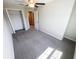 Neutral bedroom with a carpeted floor and a closet with shelving at 4461 Globe Thistle Dr, Tampa, FL 33619