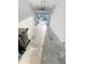 Clean, spacious garage with white walls and an open door leading outside at 4461 Globe Thistle Dr, Tampa, FL 33619