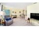 Cozy living room with comfortable seating, dining area, and bright natural light at 5216 81St N St # 2, St Petersburg, FL 33709