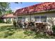 Charming condo with a red tile roof and a well-maintained lawn at 601 N Hercules Ave # 1602, Clearwater, FL 33765