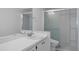 Clean bathroom featuring sink, vanity and enclosed shower at 601 N Hercules Ave # 1602, Clearwater, FL 33765