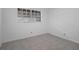 Bright bedroom with tile floor, a window, and neutral tones at 601 N Hercules Ave # 1602, Clearwater, FL 33765