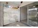 Relaxing screened patio with sliding glass doors and decorative lattice at 601 N Hercules Ave # 1602, Clearwater, FL 33765