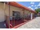 Outdoor patio with ceiling fans and a table and chairs set, great for outdoor dining at 601 N Hercules Ave # 1602, Clearwater, FL 33765