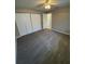 Bedroom features closet and carpet at 608 Lemonwood Dr, Oldsmar, FL 34677