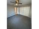 Bedroom features closet and carpet at 608 Lemonwood Dr, Oldsmar, FL 34677