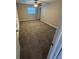 Cozy bedroom with neutral carpeting and window allowing for natural light at 608 Lemonwood Dr, Oldsmar, FL 34677