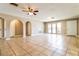 Open living area with tile flooring, neutral paint, and multiple access points at 608 Lemonwood Dr, Oldsmar, FL 34677