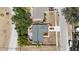 Aerial view of the house with a grey patio and driveway parking a bright orange car at 612 Bryan Terrace Dr, Brandon, FL 33511