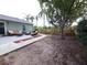 Relaxing backyard with a patio, lush landscaping, and serene outdoor space at 612 Bryan Terrace Dr, Brandon, FL 33511