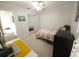 Bright bedroom featuring natural light, mirrored closet doors, and a quaint accent wall at 612 Bryan Terrace Dr, Brandon, FL 33511