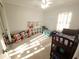 Bright bedroom with a bunk bed, a cozy single bed, and playful decorations at 612 Bryan Terrace Dr, Brandon, FL 33511