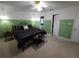Spacious bedroom featuring a ceiling fan, large bed, and carpeted floors at 612 Bryan Terrace Dr, Brandon, FL 33511
