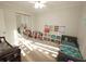 Bedroom featuring a mirrored closet, twin beds, and playful decor for  at 612 Bryan Terrace Dr, Brandon, FL 33511
