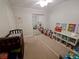 Well-lit bedroom featuring a mirrored closet, playful decor, and comfortable beds at 612 Bryan Terrace Dr, Brandon, FL 33511