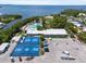 Aerial view of community amenities including a pool, basketball courts and parking at 6511 Georgia Ave, Bradenton, FL 34207