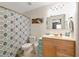 Light and bright bathroom featuring beach decor and a shower tub with shower curtain at 6511 Georgia Ave, Bradenton, FL 34207